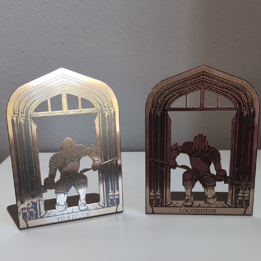 Harry Potter Hogwarts Knights Metal Bookends Piertotum Locomotor Gold